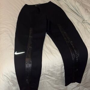 Nike Black Athletic Pants with Reflective Detail